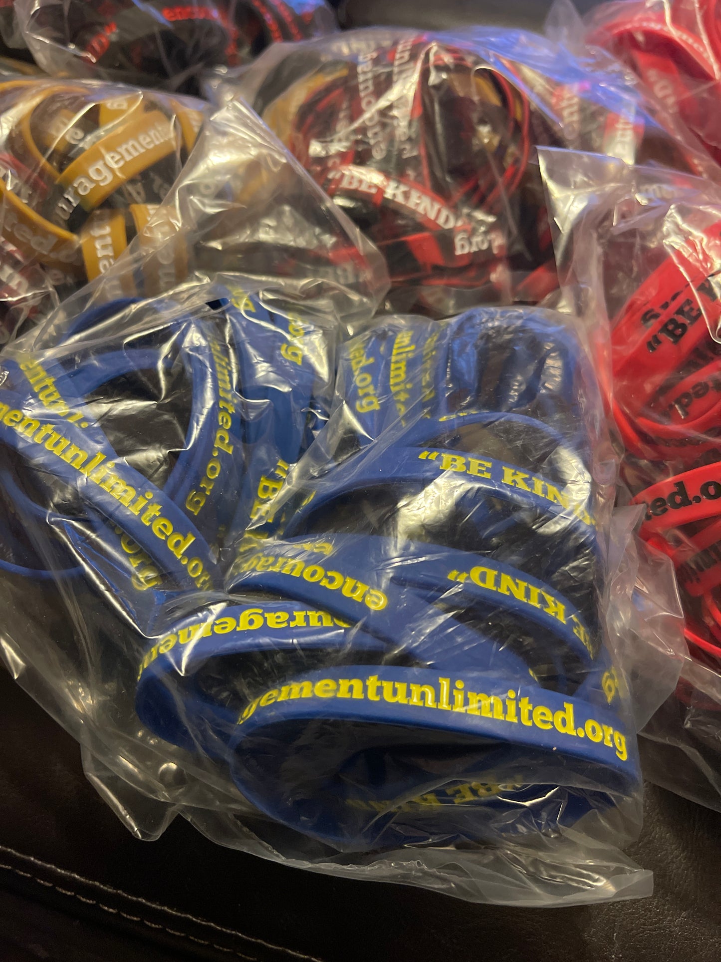 “BE KIND” wristbands (different colors)