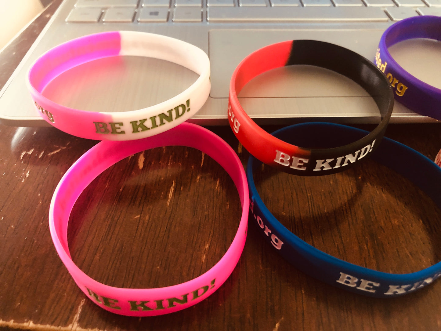 “BE KIND” wristbands (different colors)